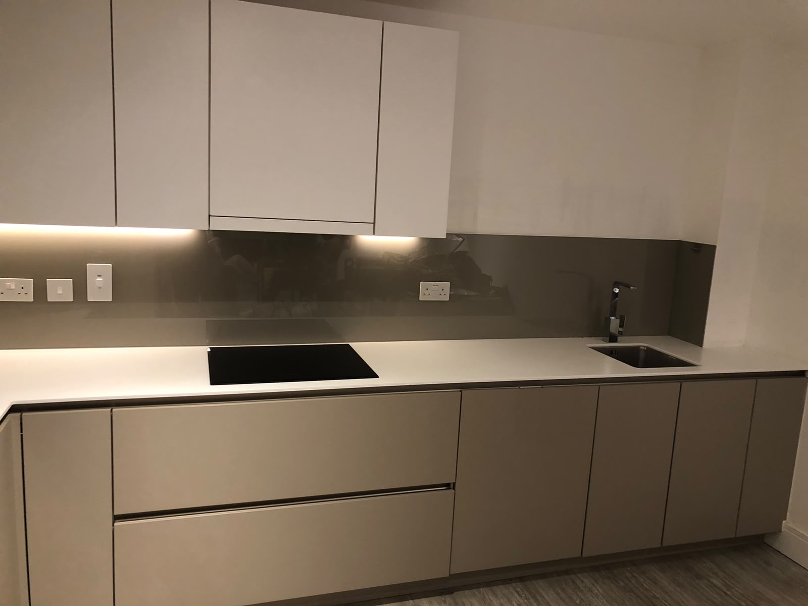 Clean contemporary kitchen with induction hob